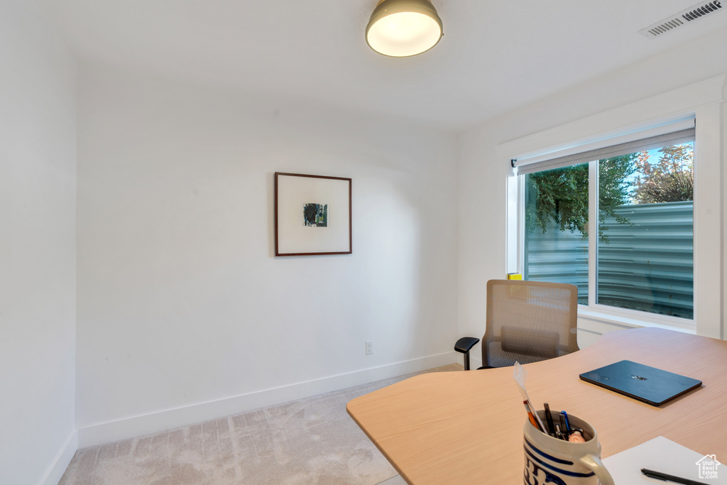 View of carpeted home office