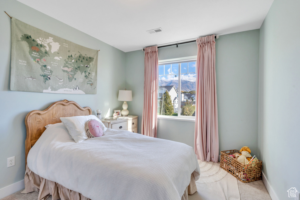 View of carpeted bedroom