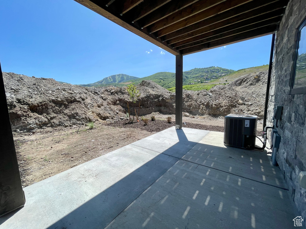 View of patio / terrace featuring a mountain view