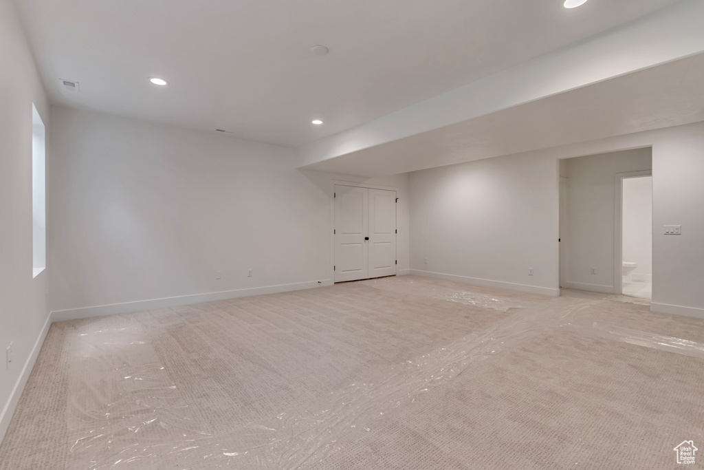 Spare room featuring recessed lighting, baseboards, and visible vents