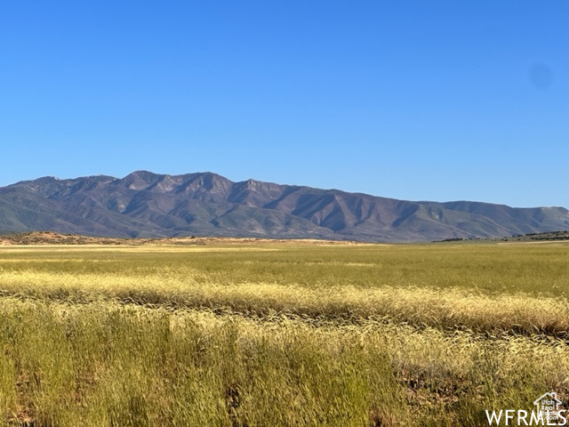 Property view of mountains featuring a rural view