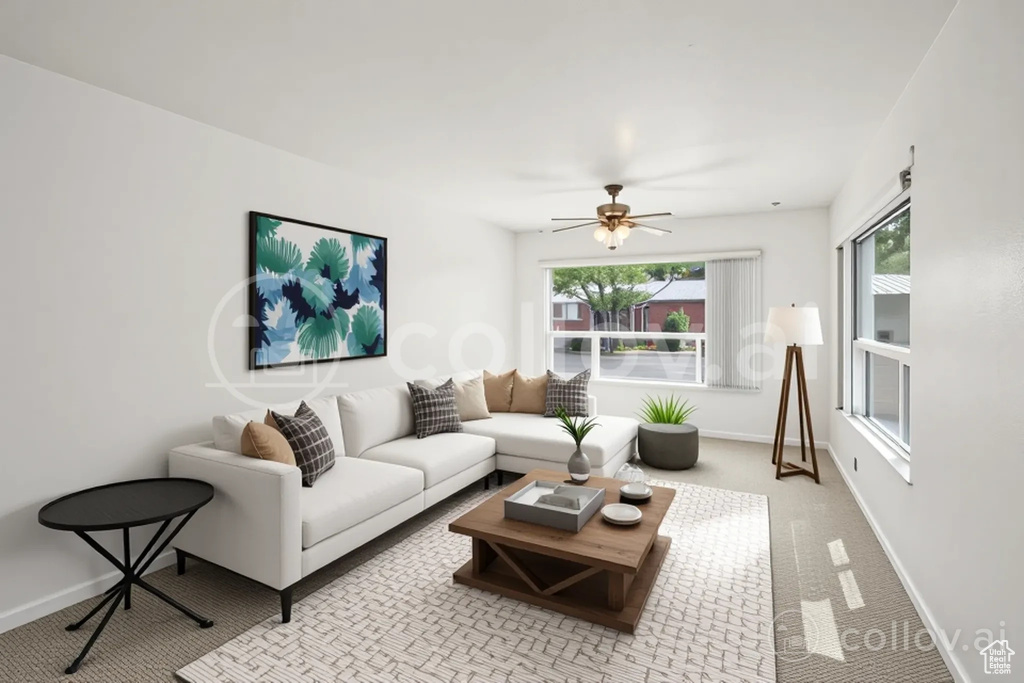 Living room with a ceiling fan and carpet
