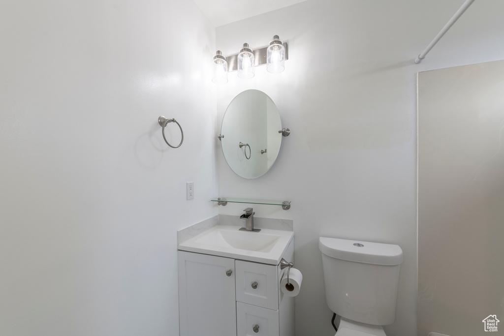 Bathroom featuring toilet and vanity