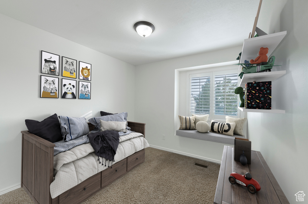 View of carpeted bedroom