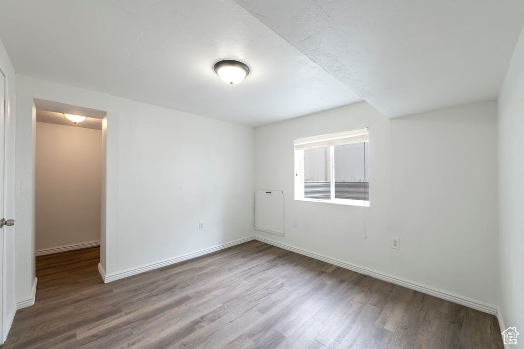 Spare room featuring hardwood / wood-style flooring