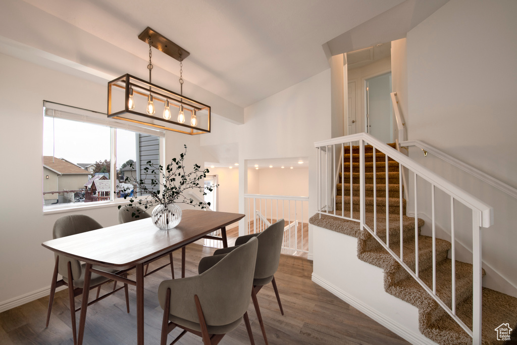 Dining space featuring dark hardwood / wood-style flooring