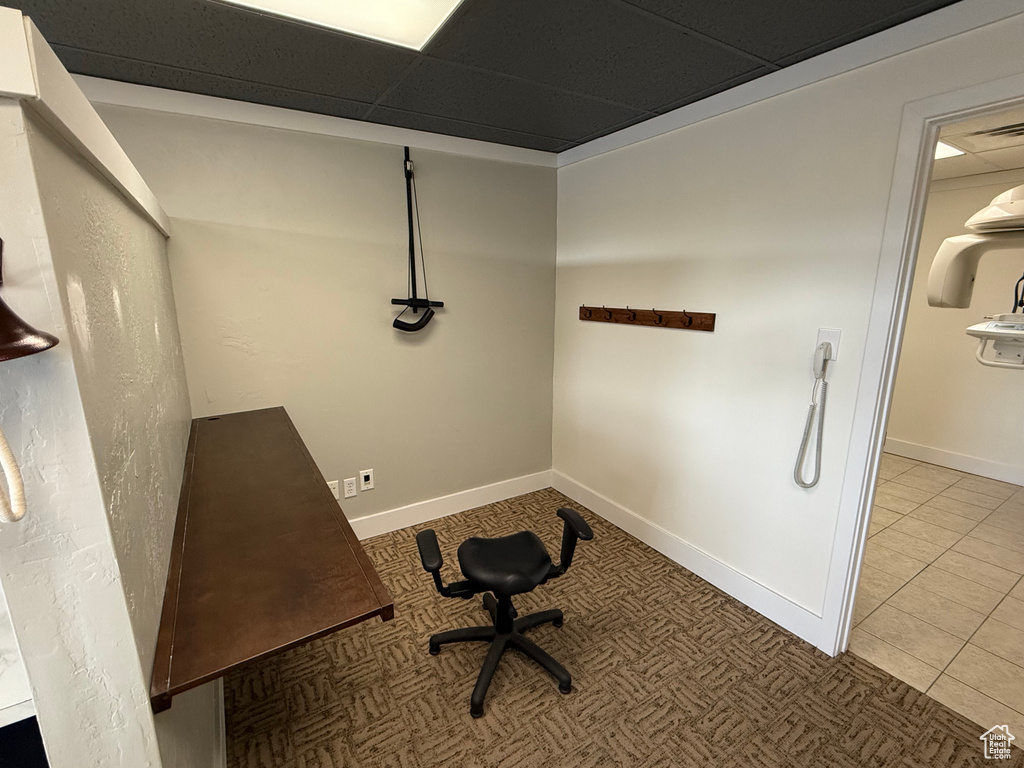 Miscellaneous room with tile patterned flooring