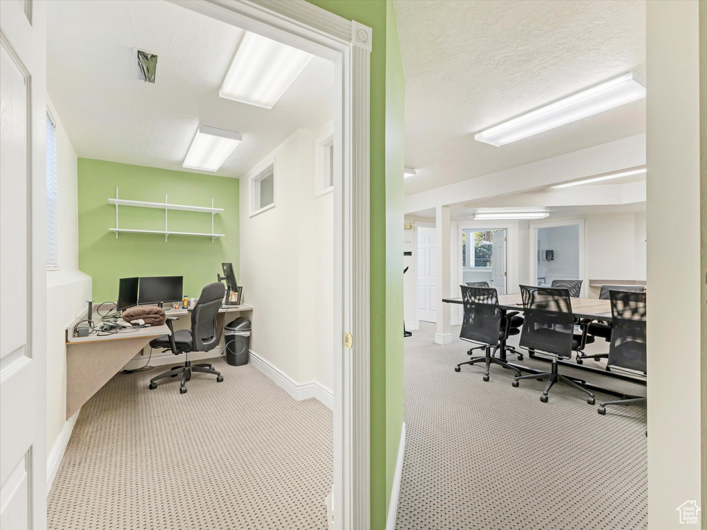 View of carpeted home office