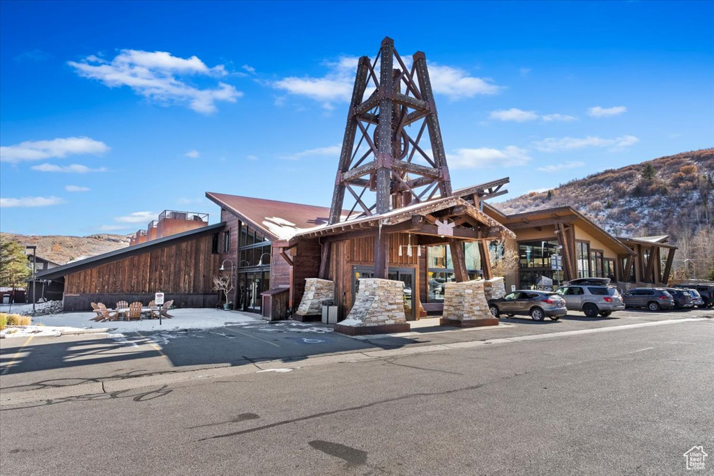 View of front of property with a mountain view