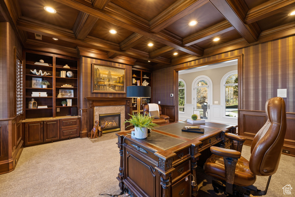 Office with ornamental molding, light colored carpet, beamed ceiling, and coffered ceiling