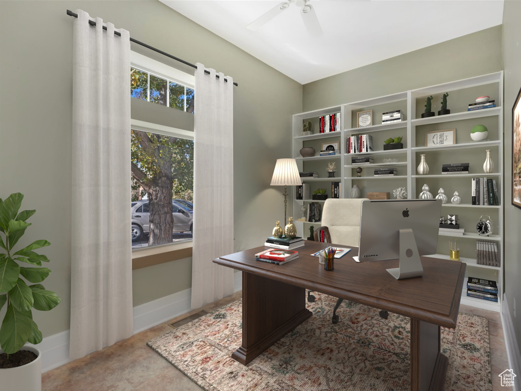 Office space with visible vents, a ceiling fan, and baseboards