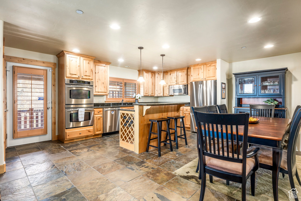 Dining area featuring sink