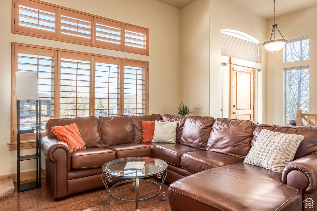 Living room with hardwood / wood-style flooring