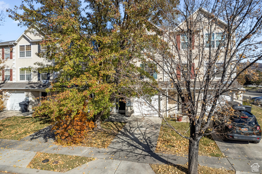 Obstructed view of property featuring a garage