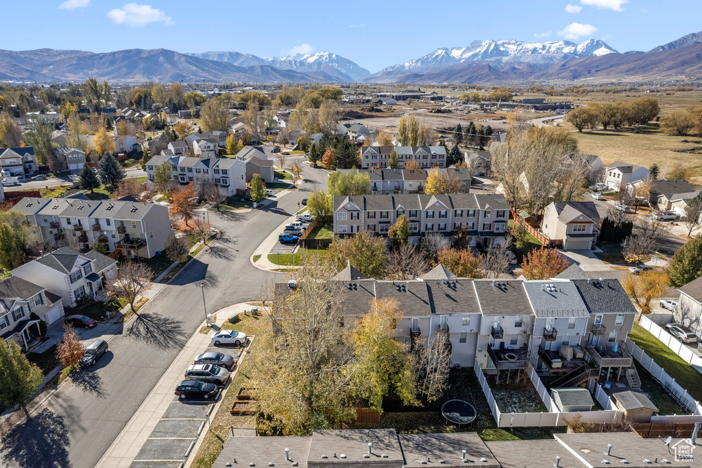 Birds eye view of property with a mountain view