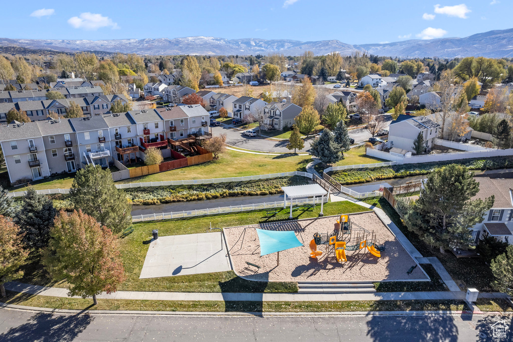 Birds eye view of property featuring a mountain view