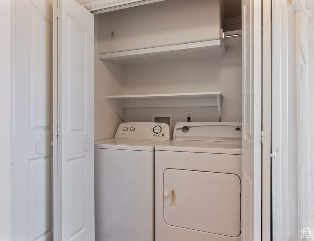 Laundry area with washing machine and dryer and laundry area