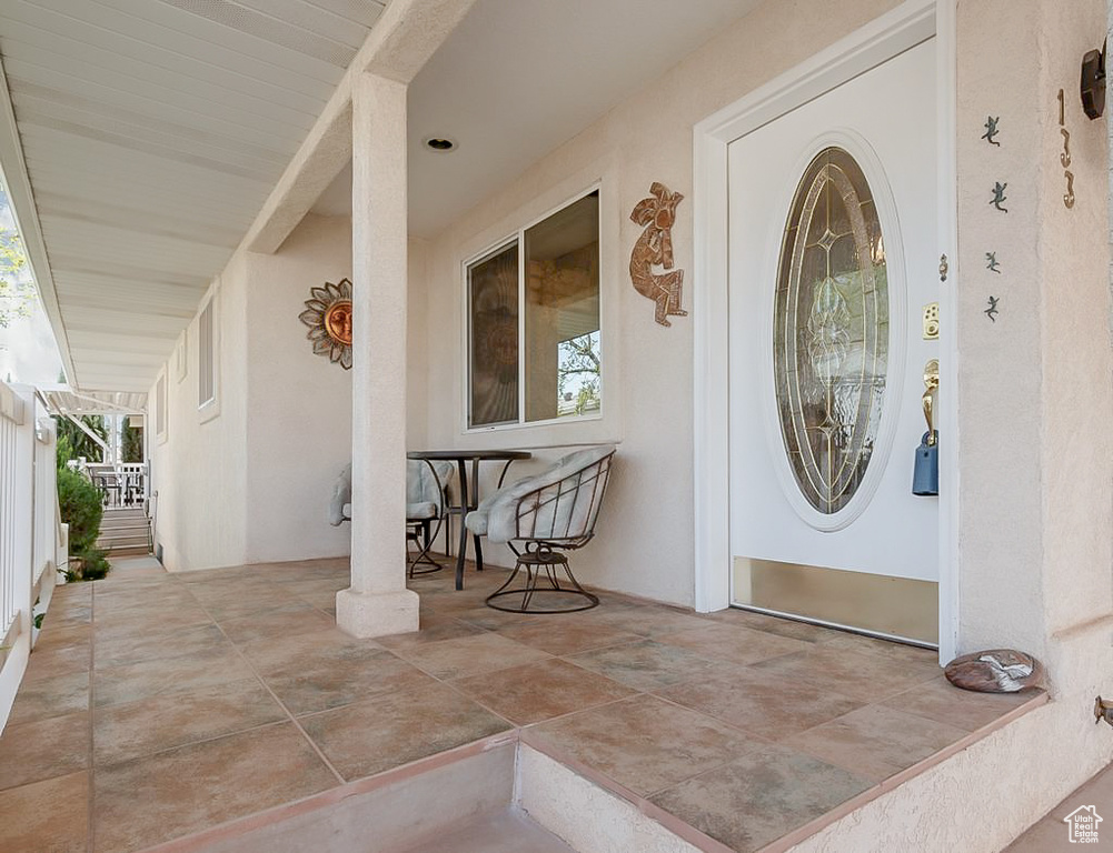 Property entrance with stucco siding
