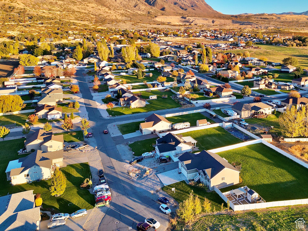 Birds eye view of property with a mountain view