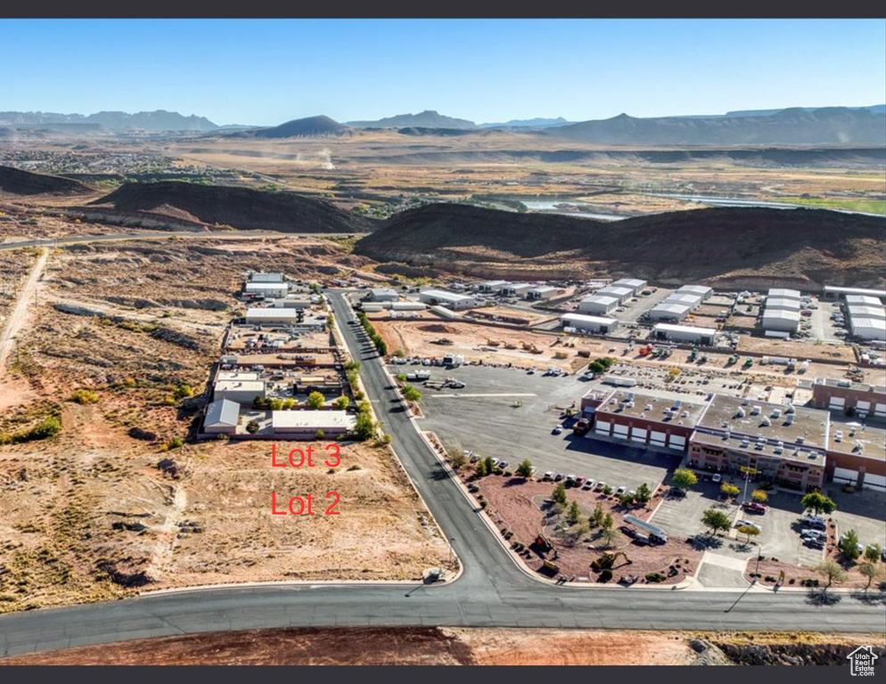 Drone / aerial view featuring a mountain view