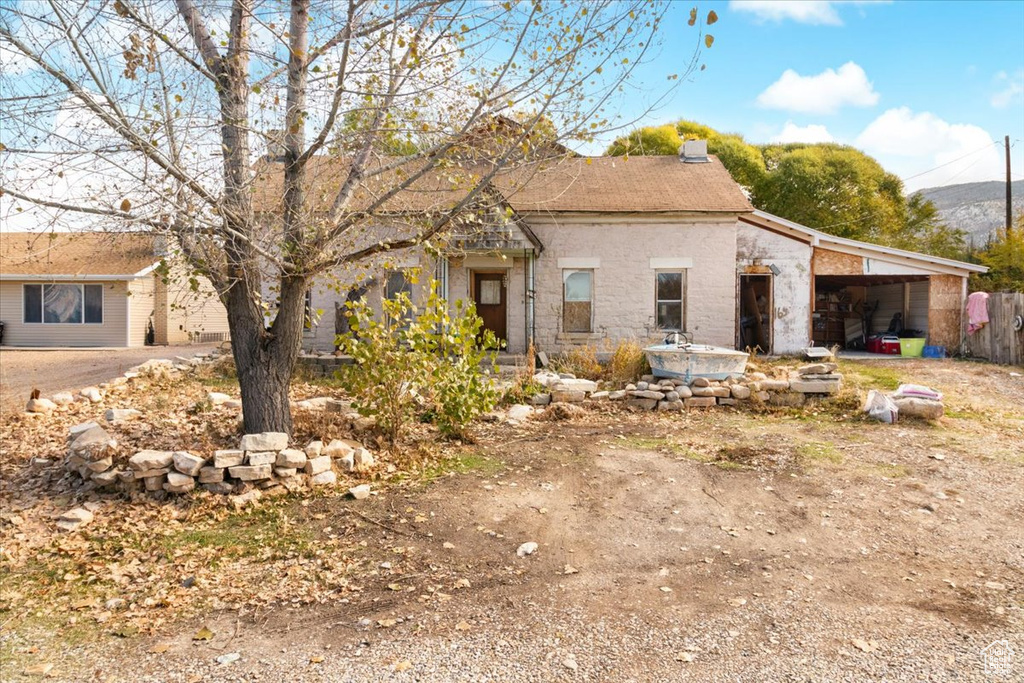 View of front of property with a garage