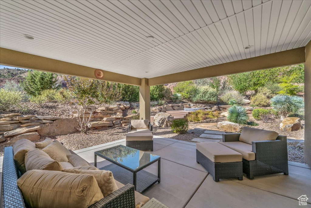 View of patio featuring an outdoor hangout area