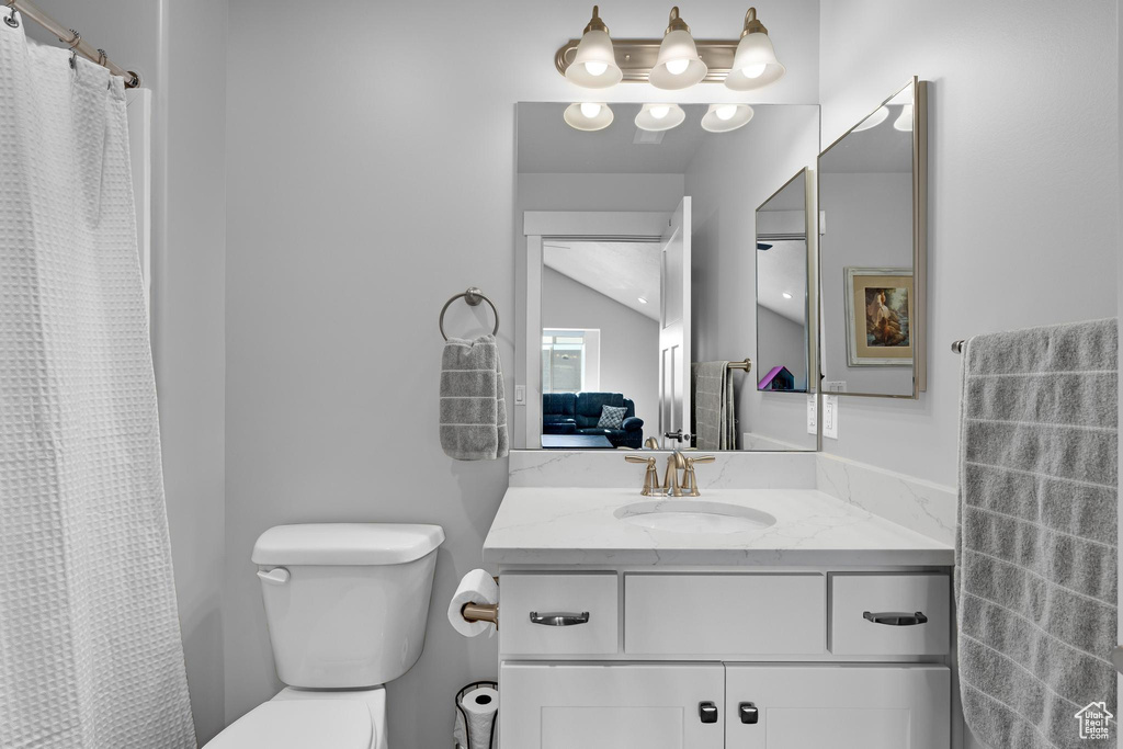 Bathroom featuring toilet and vanity