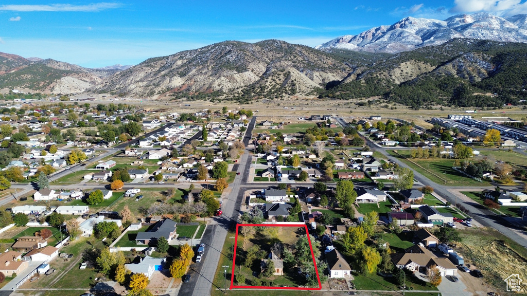Birds eye view of property featuring a mountain view