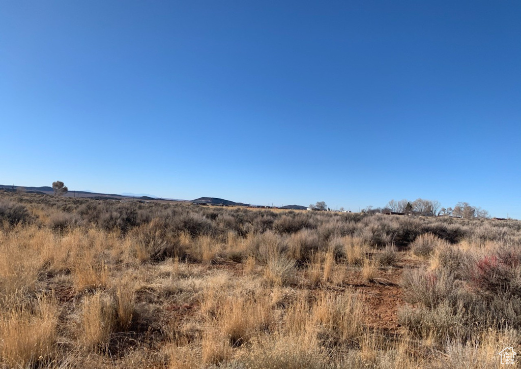 Property view of mountains featuring a rural view