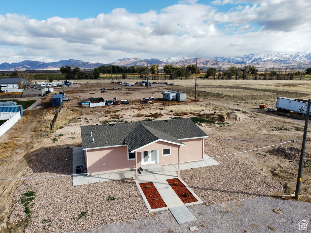 Aerial view with a rural view and a mountain view