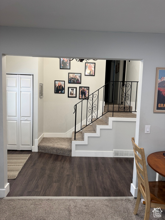 Staircase with wood-type flooring