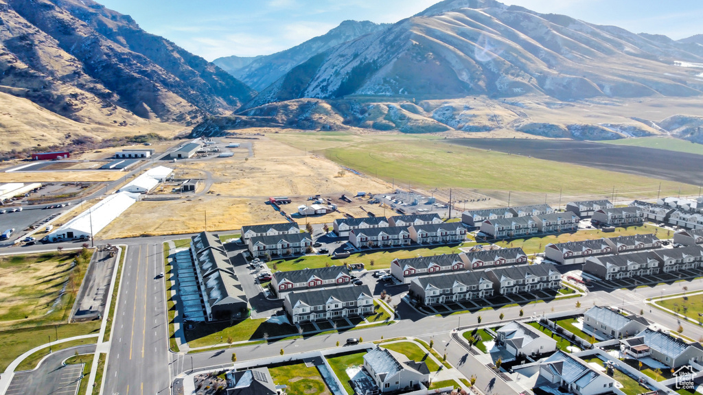 Birds eye view of property with a mountain view