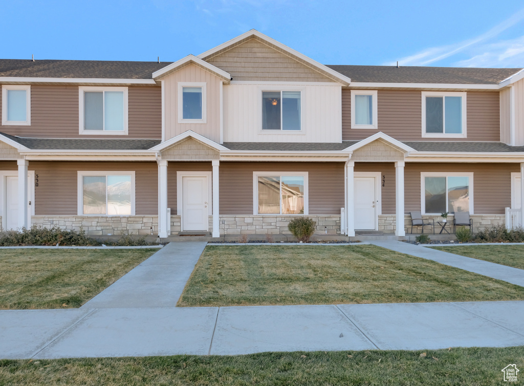 View of front of home with a front lawn