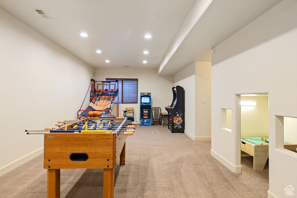 Playroom featuring light carpet