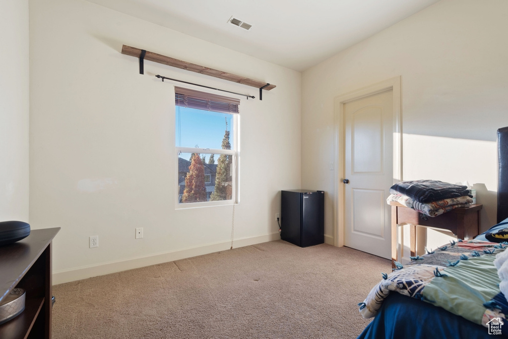 View of carpeted bedroom