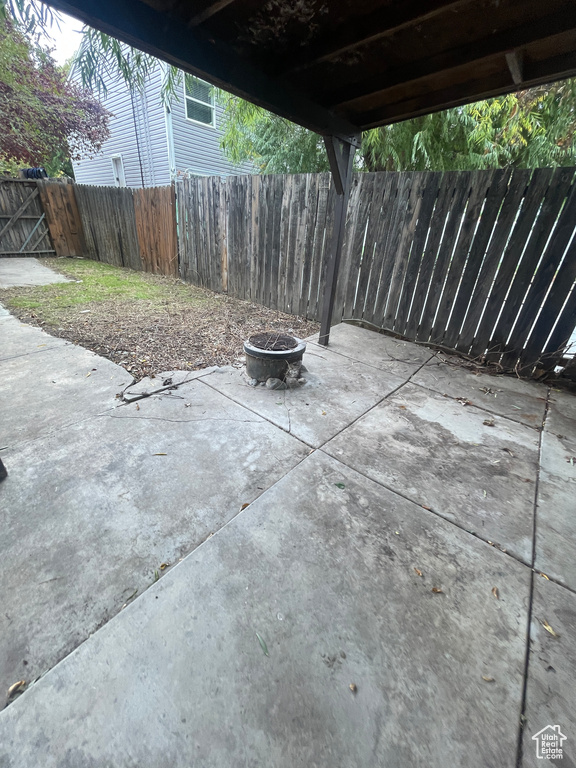 View of patio / terrace with a fire pit