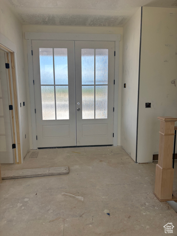 Entryway with french doors and plenty of natural light