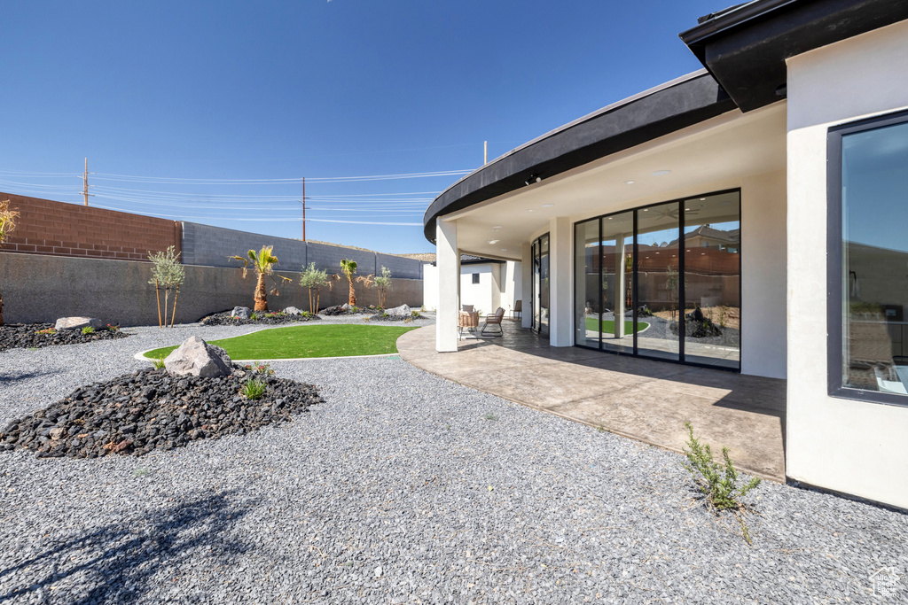 View of yard with a patio area