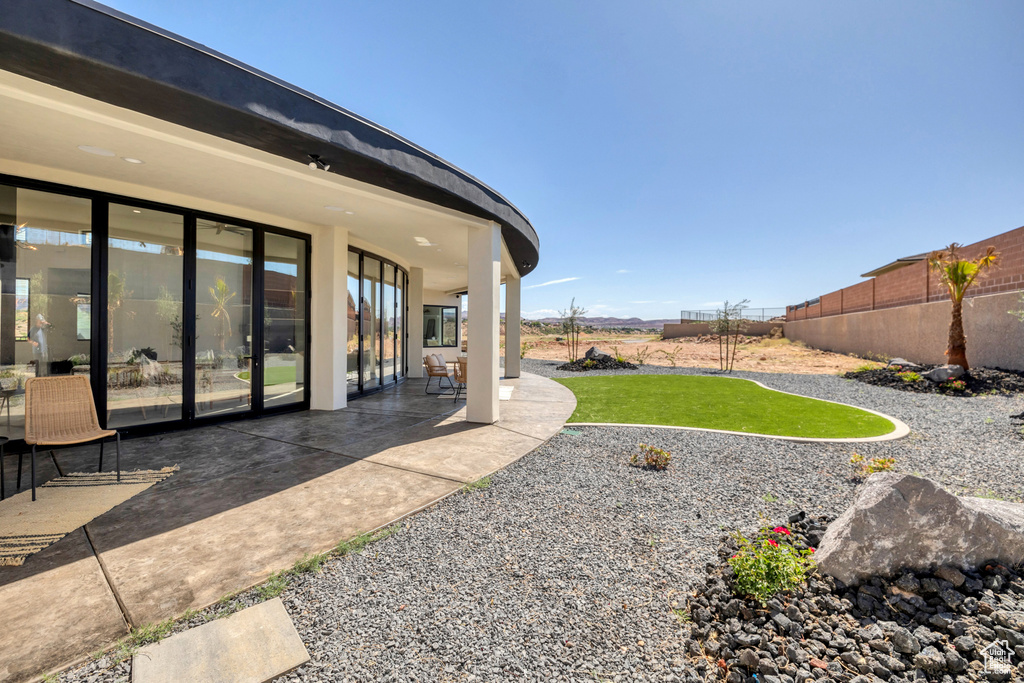 View of yard with a patio area