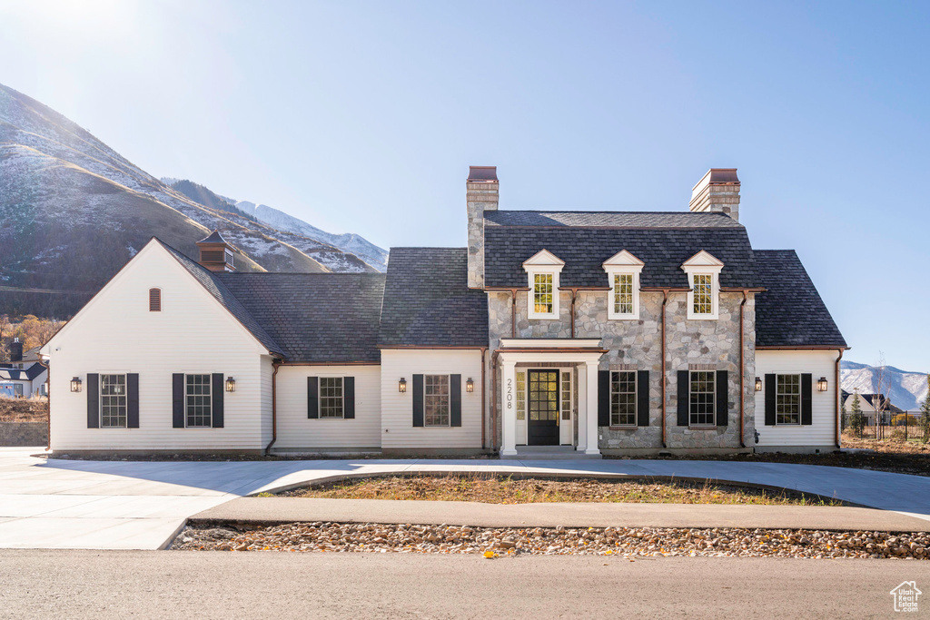 View of front of property featuring a mountain view