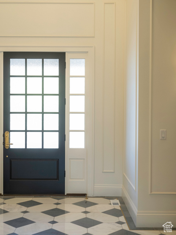 Doorway to outside featuring a wealth of natural light