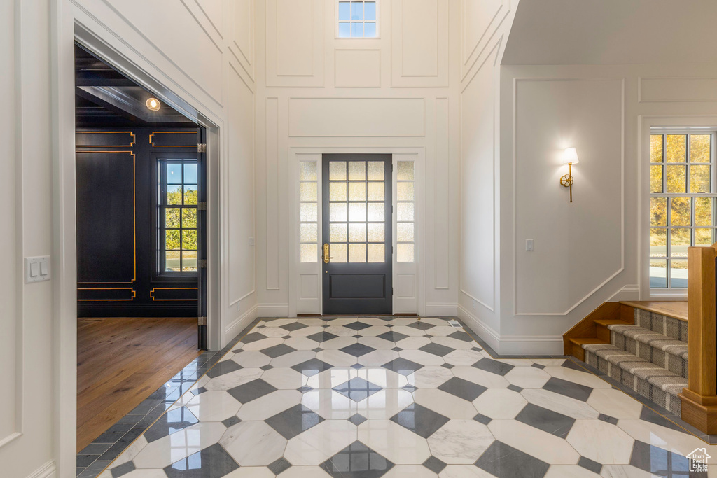 Entrance foyer featuring wood-type flooring