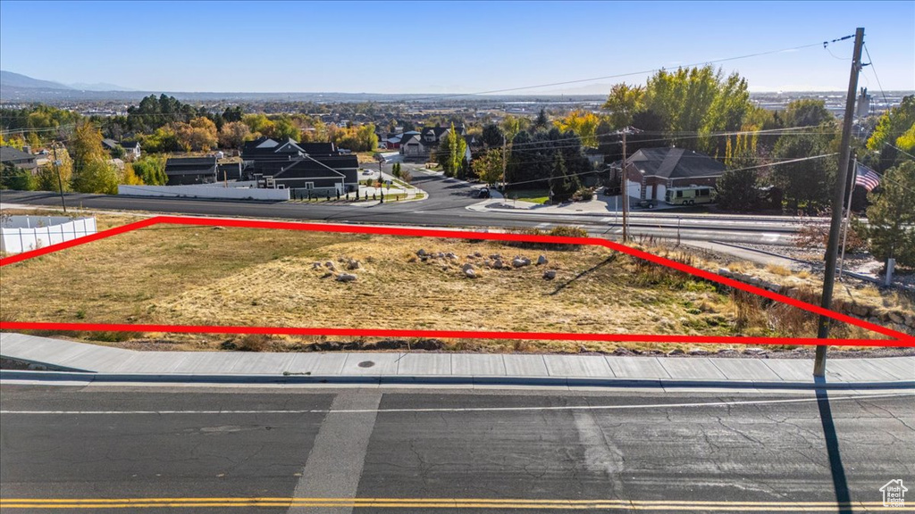 Birds eye view of property with a mountain view