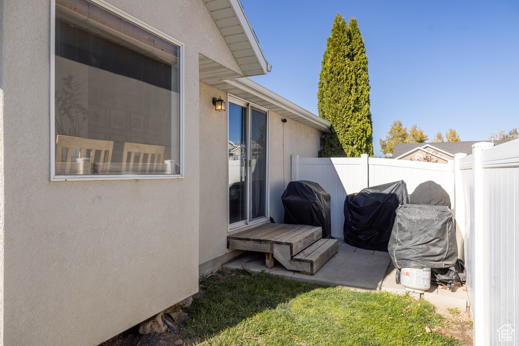 Exterior space featuring a grill