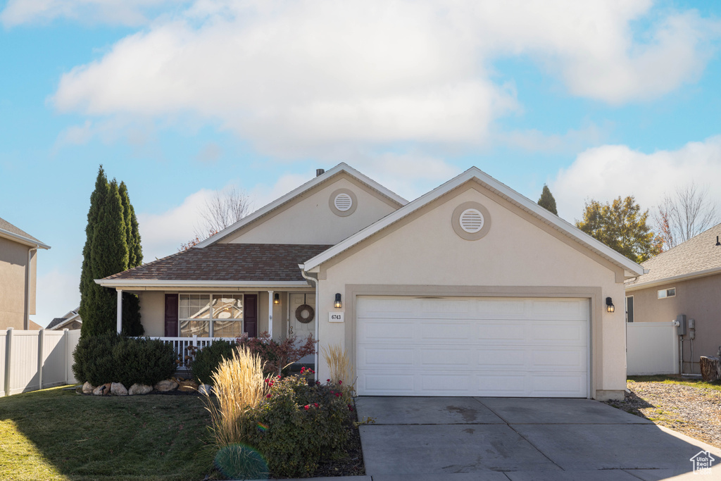 Single story home with a garage