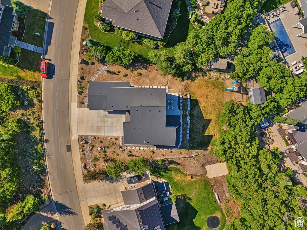 Aerial view of property\'s location featuring nearby suburban area