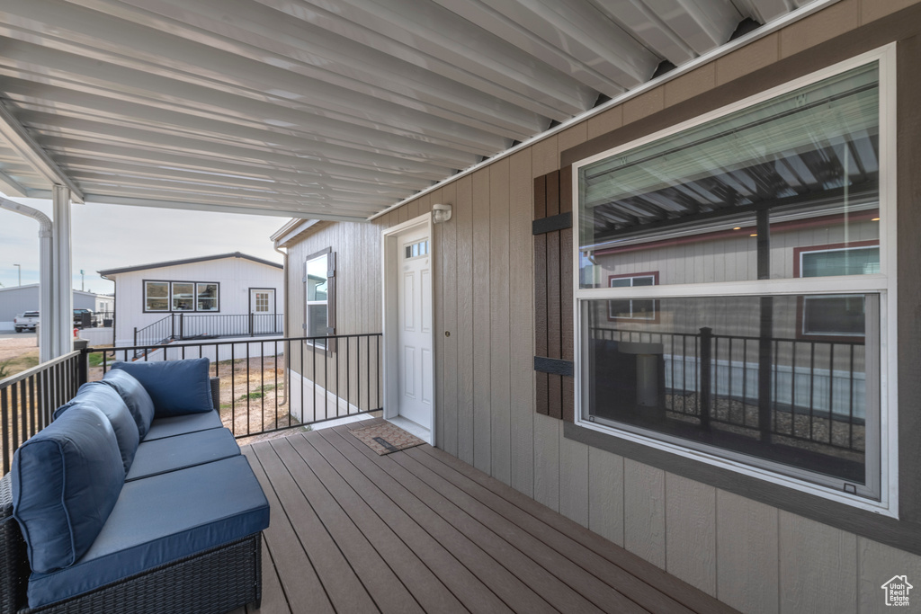 Deck with outdoor lounge area and covered porch