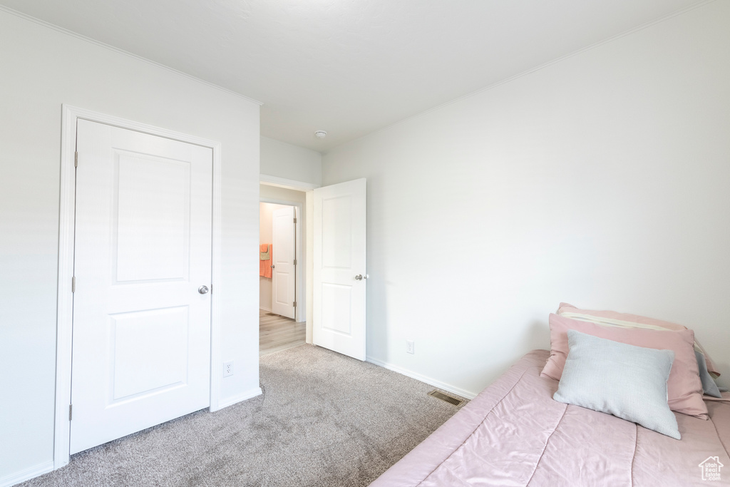 View of carpeted bedroom