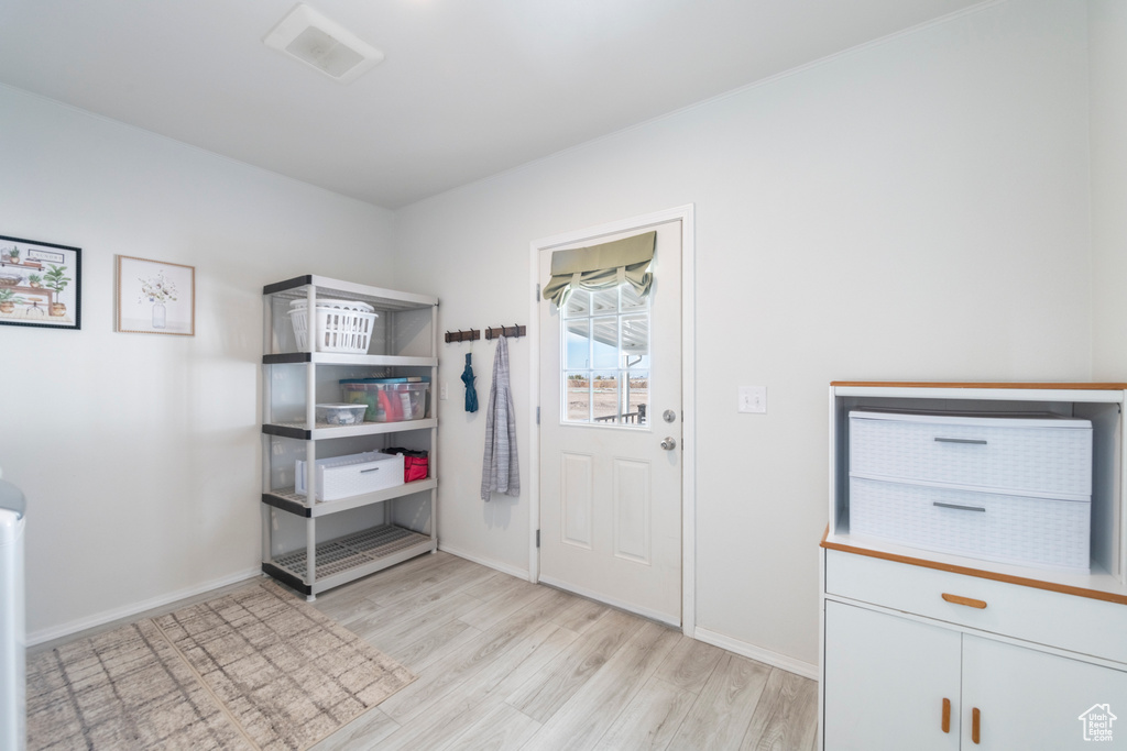 Washroom featuring light hardwood / wood-style flooring