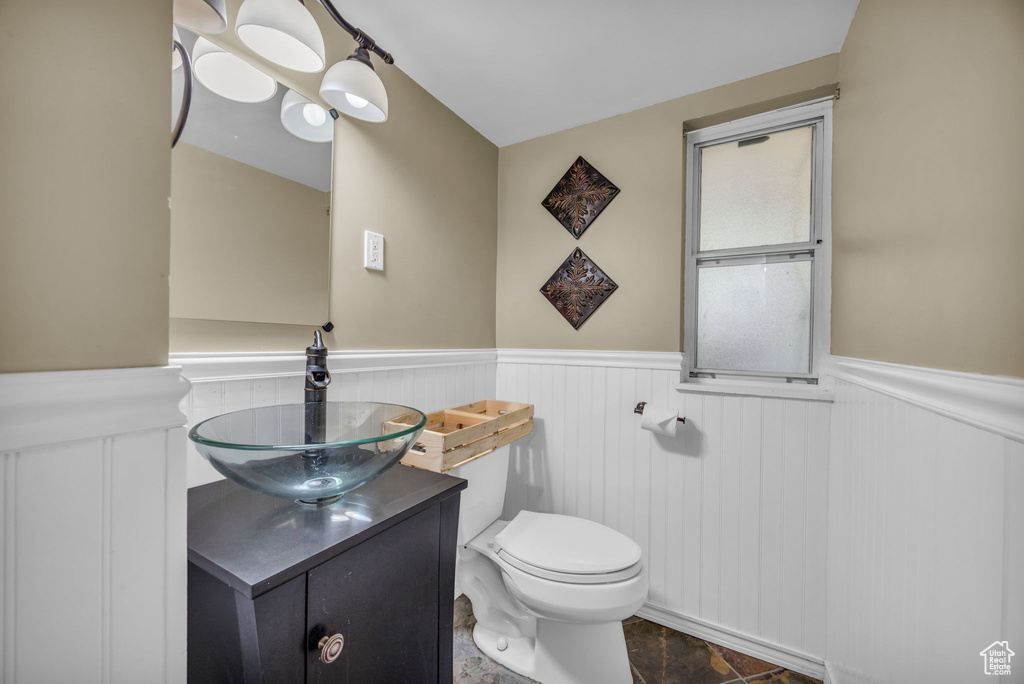 Bathroom with toilet and vanity